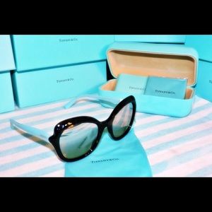 Tiffany & Co. shades and clears for her.